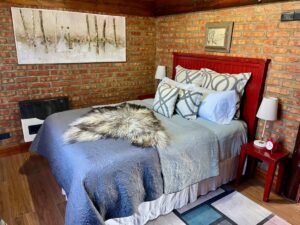 Dormitorio de la cabaña Maura de One Cabañas, alojamiento en los Antiguos, Santa Cruz